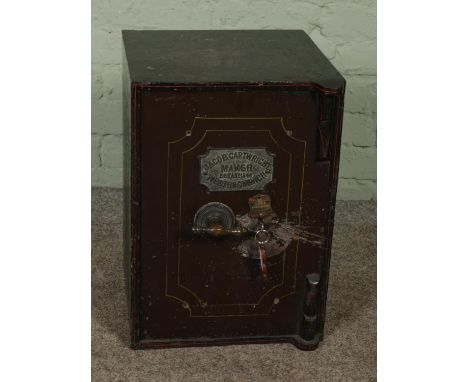 A vintage Jacob Cartwright, West Bromich cast iron safe with key. Approx. external dimensions 36cm x 33cm x 51cm. (key in off