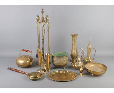 A quantity of mainly brasswares, to include fireside companion set, Eastern inspired teapot, miniature bed warming pan etc.