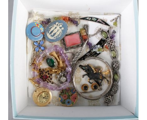 A box of costume jewellery. Includes Ingersoll mechanical watch fob, Celtic style jewellery, brooches etc.