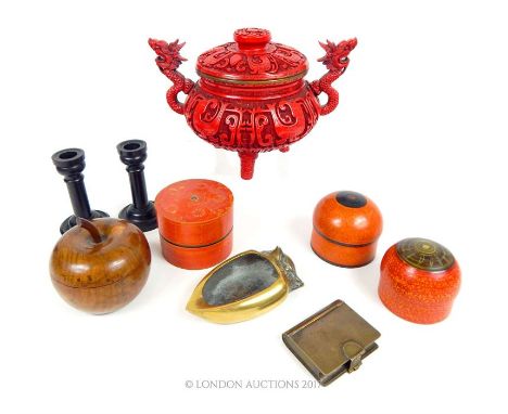 A reproduction Chinese Cinnabar style twin handled lidded bowl together with wooden trinket boxes; two ebony dwarf candle sti