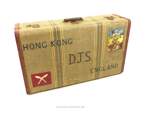 A vintage suitcase, written 'Hong Kong D.J.S. England' to the side, 50 x 76 x 23cm.