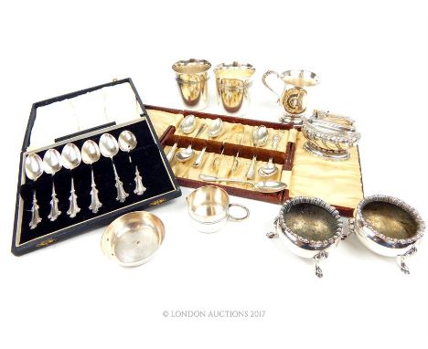 A set of six hallmarked silver teaspoons (one broken) in a case, together with a collection of silver plated items including 