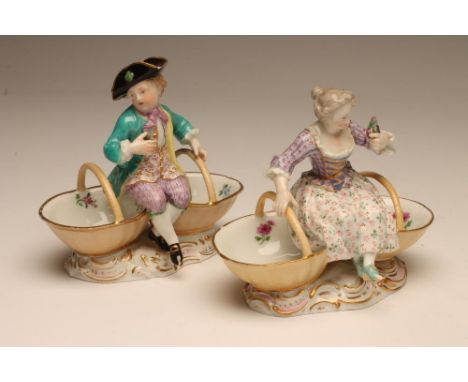 A PAIR OF MEISSEN PORCELAIN FIGURAL SWEETMEATS, late 19th century, modelled as a boy wearing a black hat, yellow lined turquo