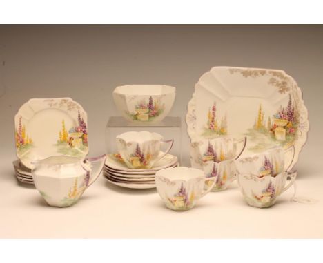 AN ART DECO SHELLEY CHINA QUEEN ANN SHAPE PART TEA SERVICE printed in underglaze brown and overpainted in colours with the "U