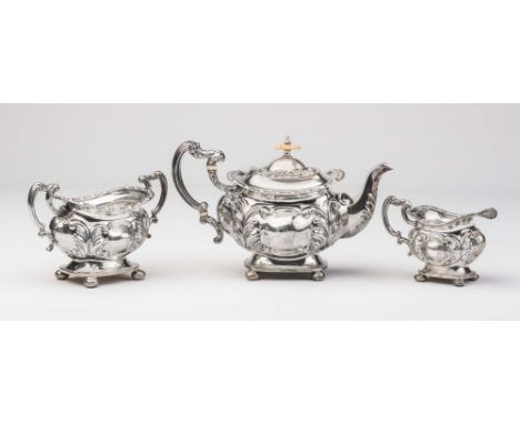 A LATE VICTORIAN SILVER THREE PIECE TEA SERVICE, maker's mark W.A., London 1896, of rounded oblong baluster form raised upon 