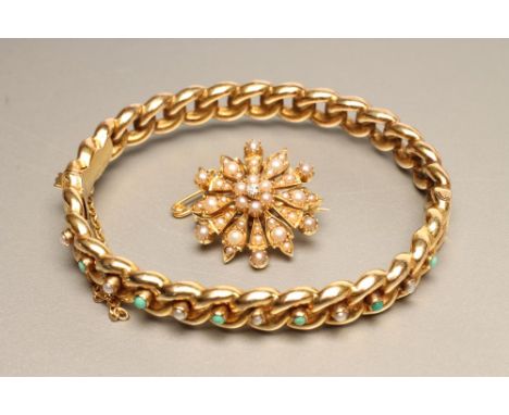 A LATE VICTORIAN 15CT GOLD STIFF HINGED BANGLE, the fixed "chain" set with six alternating seed pearls and small turquoise be
