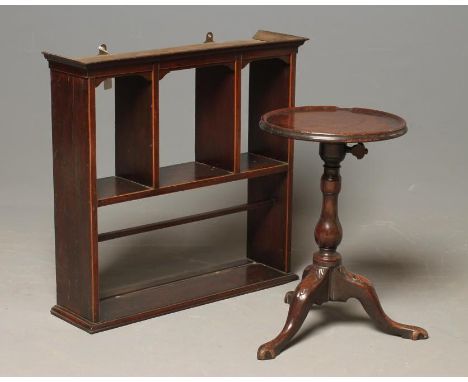 A GEORGIAN MAHOGANY KETTLE STAND, mid 18th century and later, the dished circular adjustable top on baluster turned stem and 