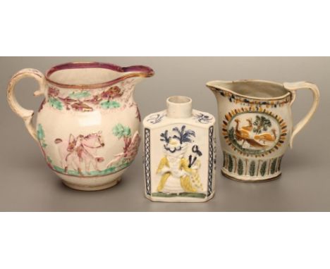 A PRATTWARE TEA CADDY, early 19th century, moulded in relief with Macaroni figures painted in typical palette, 4 1/2" high, t