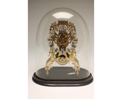 A BRASS SKELETON MANTEL TIMEPIECE, the single fusee chain movement with anchor escapement, pierced and silvered dial with Rom