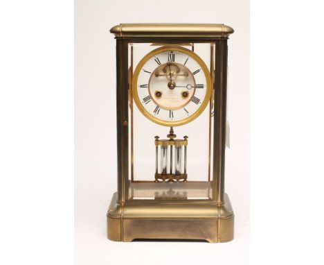 A BRASS CASED FOUR GLASS MANTEL CLOCK, the twin barrel movement with visible anchor escapement striking on a gong, 4 1/2" two
