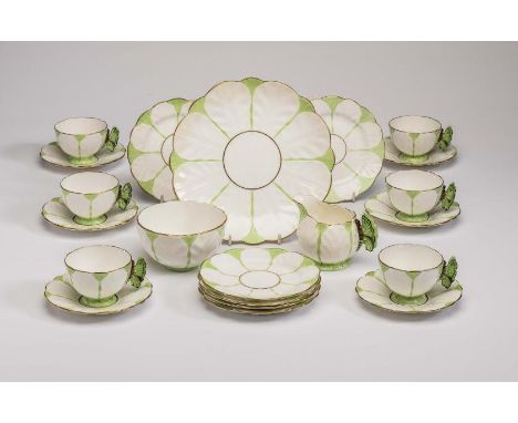 AN AYNSLEY CHINA "BUTTERFLY" TEA SERVICE, 1930's, with green highlighted moulded leaves, comprising six each cups, saucers an