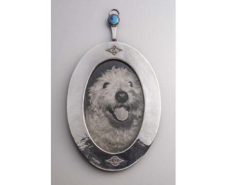 OF LOCAL INTEREST SILVER - an Arts and Crafts hanging photograph frame, maker John Gatecliff of Otley, Chester 1923, of oval 