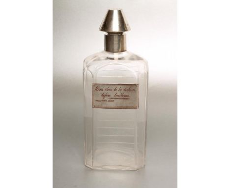 A LATE VICTORIAN SILVER MOUNTED GLASS NOVELTY SPIRIT DECANTER, maker Heath &amp; Middleton, Birmingham 1896, of canted oblong