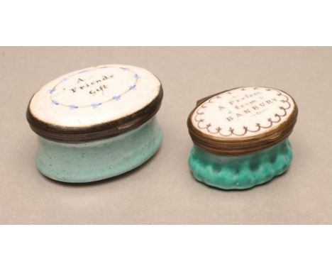 TWO BILSTON ENAMEL PATCH BOXES, late 18th century, one of oval fluted waisted form, the hinged cover inscribed "A Present fro