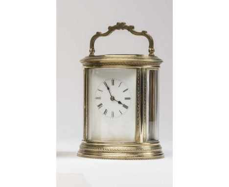 A BRASS CASED CARRIAGE CLOCK, the twin barrel movement with platform escapement striking on a gong, white enamel dial with Ro