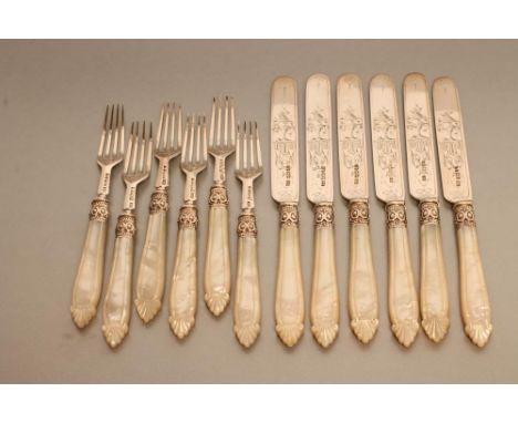 A SET OF SIX PAIRS OF VICTORIAN SILVER DESSERT KNIVES AND FORKS, maker's mark HH, Sheffield 1873 (one knife 1872), the blades