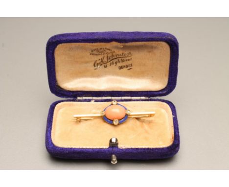 A LATE VICTORIAN BAR BROOCH centred by an oval polished coral panel within a blue enamel border set with four collet set smal