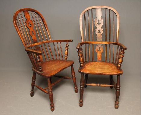 A MATCHED PAIR OF ASH AND ELM WINDSOR ARMCHAIRS, late 19th century, of hooped high back form with pierced and shaped splat, b