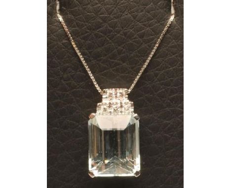 AN AQUAMARINE PENDANT, the princess cut stone claw set below a fixed stepped bale set with five diamonds in an 18ct white gol