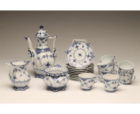 A ROYAL COPENHAGEN PORCELAIN "LACE AND DEVIL MASK" COFFEE SERVICE painted in underglaze blue with flowers, comprising eight e