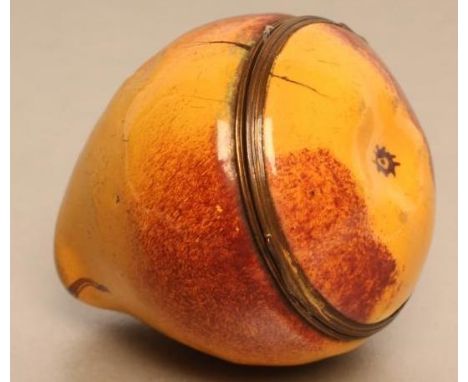 A SOUTH STAFFORDSHIRE ENAMEL PEAR BONBONIERE, mid 18th century, with painted mottled markings, and gilt metal mounts, 2 1/4" 
