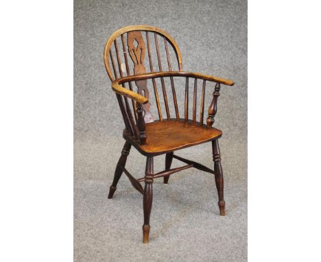 AN ASH AND ELM WINDSOR ARMCHAIR, early/mid 19th century, of low double hoop form with shaped and pierced splat, baluster turn