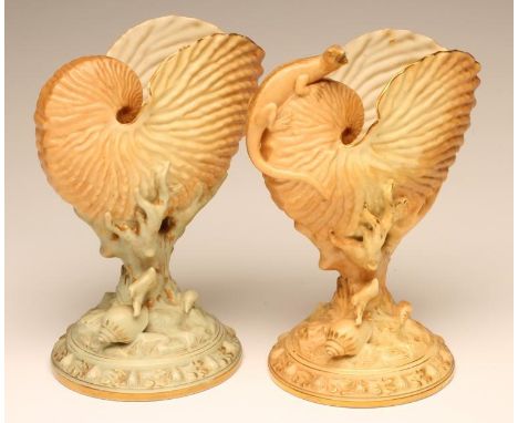 TWO ROYAL WORCESTER CHINA VASES, c.1900, each with a shell issuing from a coral twig stem on a shell and sea weed strewn circ