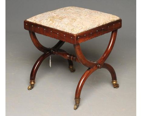 A ROSEWOOD X FRAMED STOOL, early 19th century, of square form, the drop in seat upholstered in modern tapestry weave, moulded