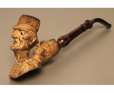 OF POLITICAL/MILITARY INTEREST, 1846, A Dumeril Meerschaum pipe, the bowl carved as a caricature of The Duke of Wellington wi