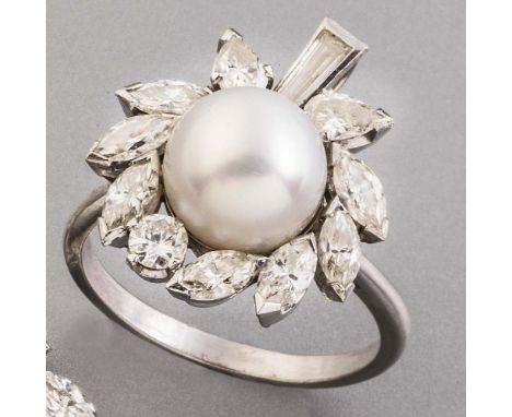A CULTURED PEARL AND DIAMOND COCKTAIL RING to match the previous lot, set with a spherical pearl to a plain unmarked white me