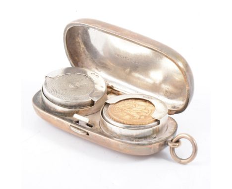 Victorian silver sovereign case, William Neale, Chester 1888, plain oval form with engraved monogram, 5.5cm; and an Edwardian