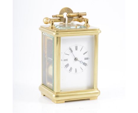 French brass cased carriage clock, hour repeating, white enamel dial, platform escapement, striking on a gong, height 13cm
