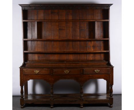 Oak dresser, in part 18th century, the base with two board top, fitted with three frieze drawers, turned baluster supports, p