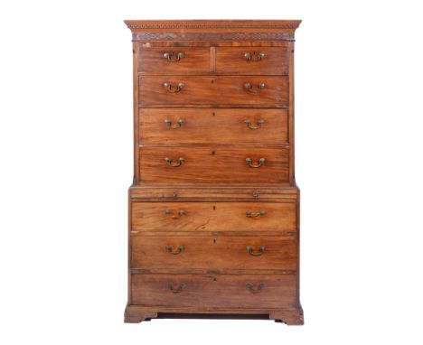 George II mahogany chest on chest, moulded and cavetto cornice, with a blind fretwork frieze, fitted with two short and the t