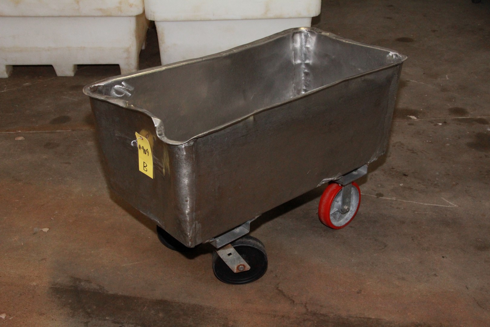 STAINLESS STEEL BUCKET ON WHEELS. 43" x 22" x 24".