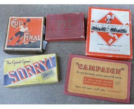 Four vintage games including Campaign and Monopoly and a Cup Final box
