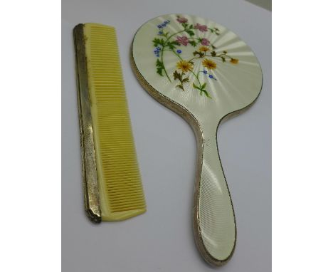 A silver and guilloche enamel mirror and a comb with a matched silver back