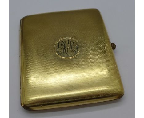 A plated cigarette case with initials