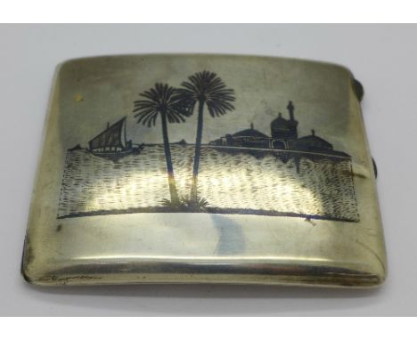 A white metal niello cigarette case with Nile scenes, 142g