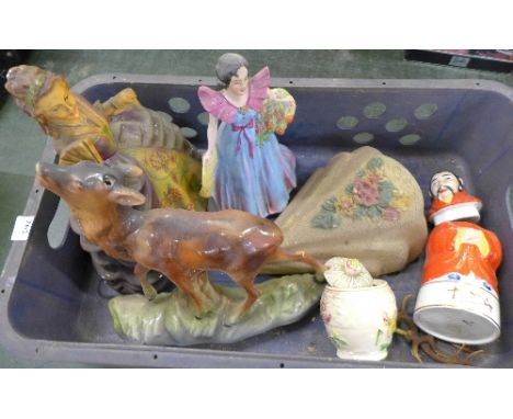 A Falcon Pottery figure, Jeanette, a chalk figure of a lady with fan, an Art Deco wall plaque, a pottery model of a stag, a P