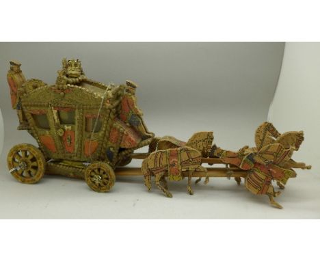 A printed paper on wood, model Coronation coach and horse with coachmen, c.1911