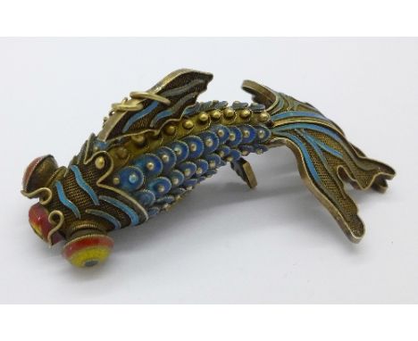 A silver gilt and enamel articulated fish, length 8cm