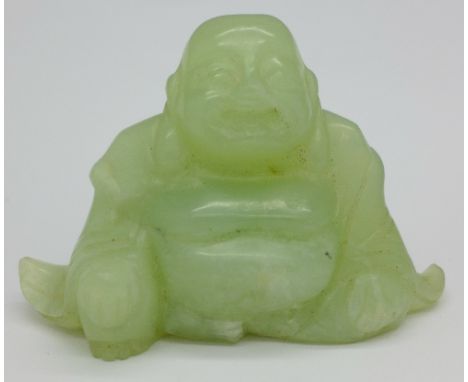 A carved jade Buddha