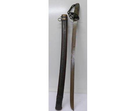 A sword and scabbard, length of blade 63cm