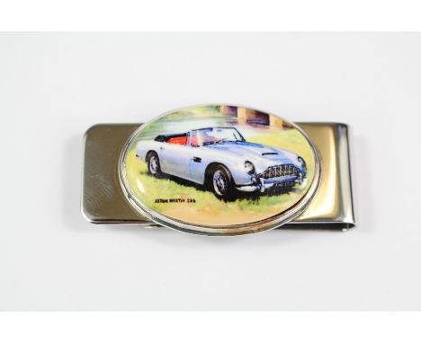 A Silver and Enamel Money Clip, depicting an Aston Martin (007), approx 20 gms.