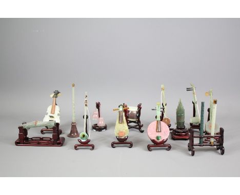 Chinese Hard-Stone Miniature Musical Instruments; the musical instruments include pipes, violin, viola, mandolin, balalaika, 