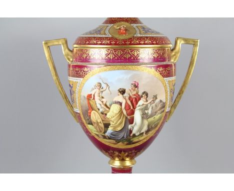 A 19th Century Royal Vienna Centerpiece Vase and Cover, finely detailed panels painted with neo-classical scenes by Eugene de