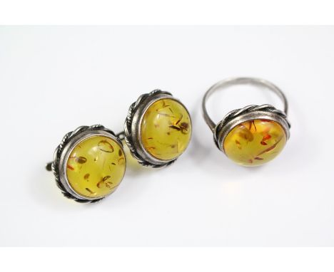 A Vintage Silver and Amber Ring, size T, together with matching earrings, approx 13 gms.