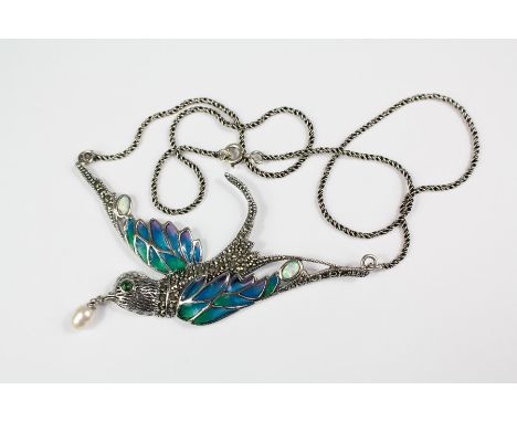 A Marcasite and Enamel Dove Pendant.
