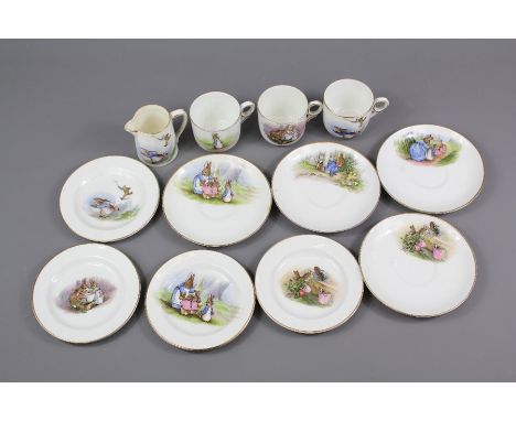 A Vintage Grimwades Part "Peter Rabbit"  Child's Tea Set; the lot includes three cups depicting the rabbits, four side plates